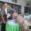 Cegah Penyebaran Corona, DPRD Touna Cek Suhu Badan Tamu