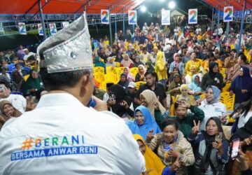 Hujan Deras Tak Surutkan Ribuan Warga Hadiri Kampanye Anwar Hafid di Nuhon